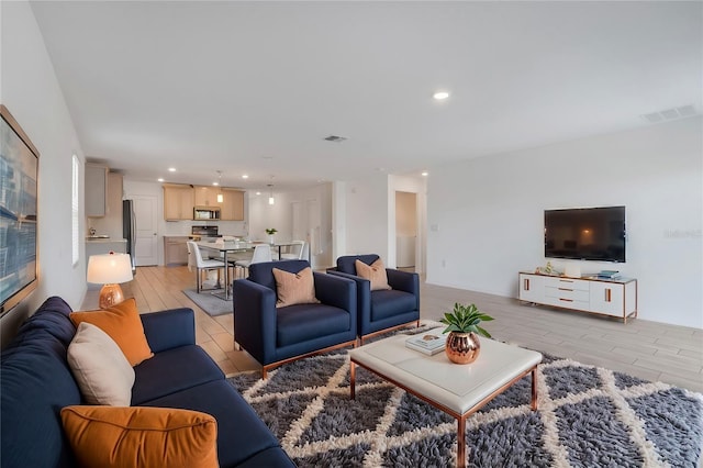 living room featuring light hardwood / wood-style flooring