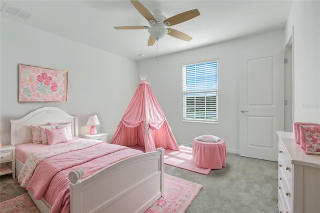 bedroom featuring ceiling fan and light colored carpet