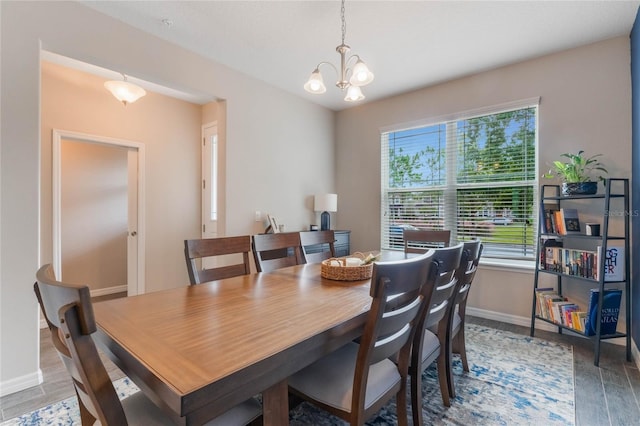 dining area with a notable chandelier