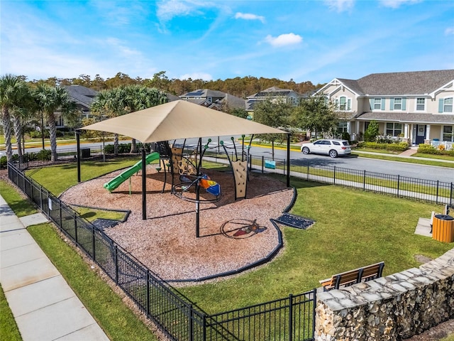 view of playground featuring a lawn