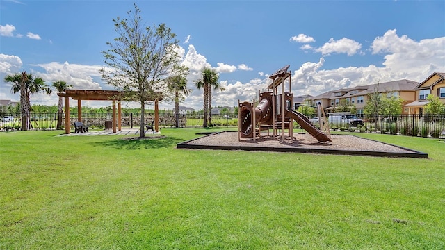 view of playground with a lawn