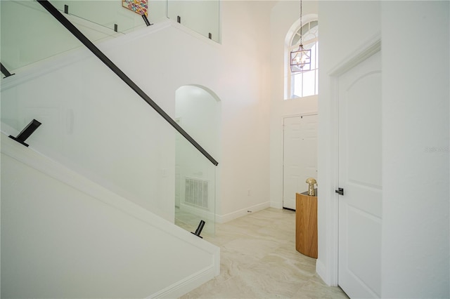 foyer with a high ceiling