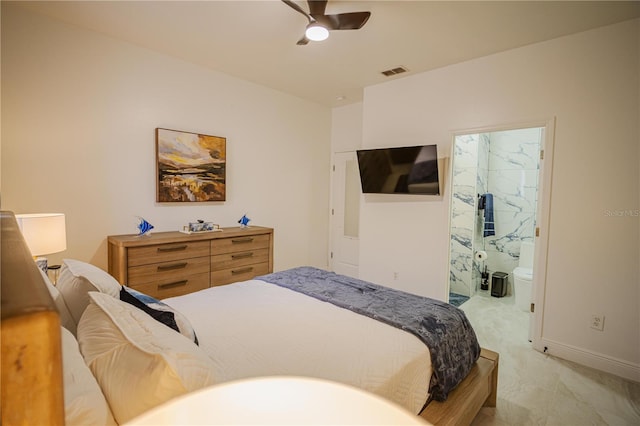 bedroom with ceiling fan and connected bathroom