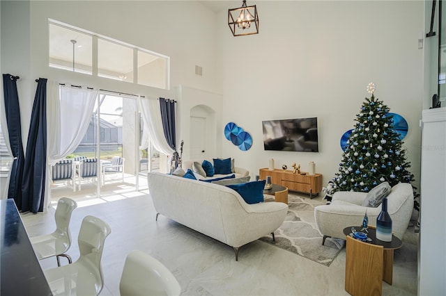 living room featuring a chandelier