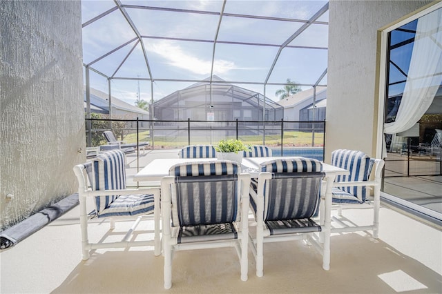 view of patio / terrace with glass enclosure