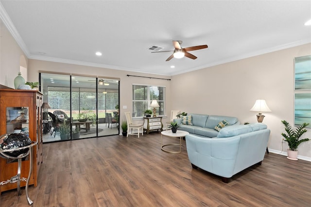 living room featuring ceiling fan, dark hardwood / wood-style floors, and crown molding