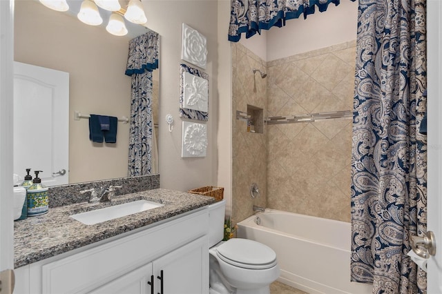 full bathroom with vanity, toilet, and shower / tub combo with curtain