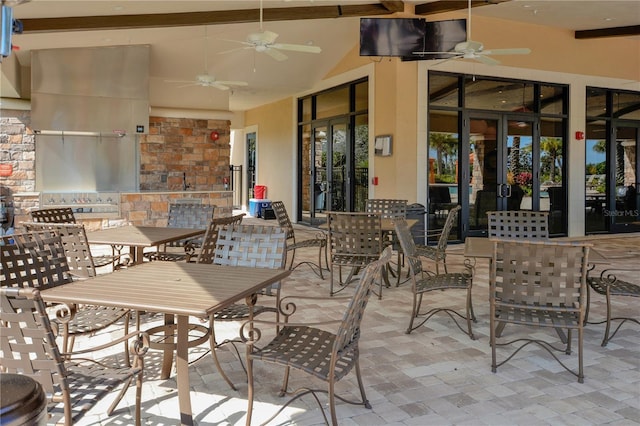 view of patio featuring ceiling fan