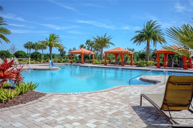 view of pool with a gazebo and a patio area