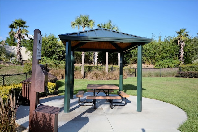 view of home's community with a gazebo and a yard