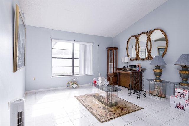 living area with vaulted ceiling