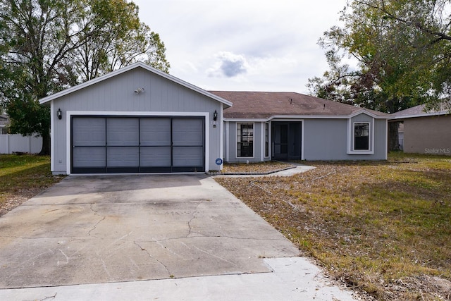 single story home with a garage