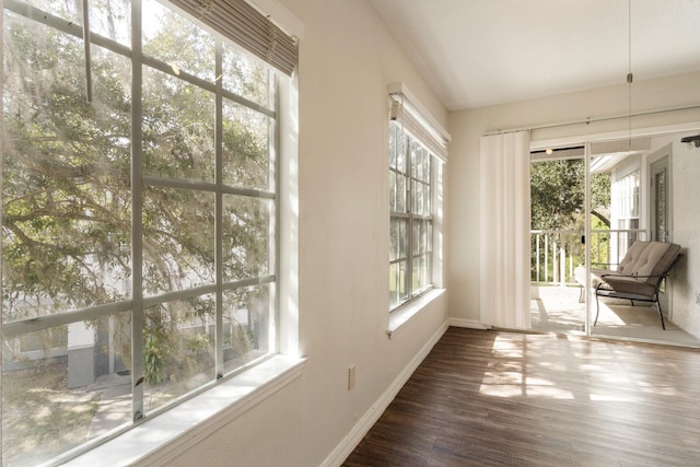 unfurnished sunroom featuring a wealth of natural light