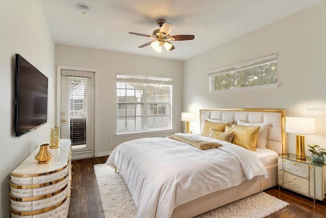 bedroom featuring dark hardwood / wood-style flooring and ceiling fan