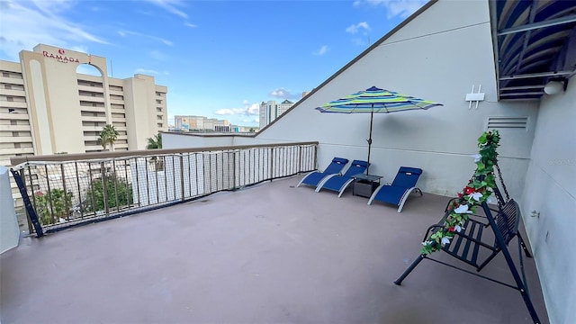 view of patio with a balcony