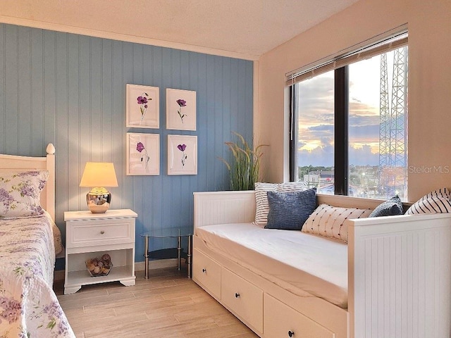 bedroom with light hardwood / wood-style floors