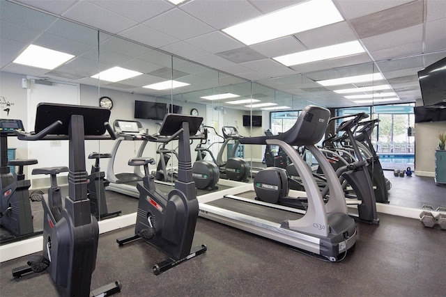 gym featuring a paneled ceiling