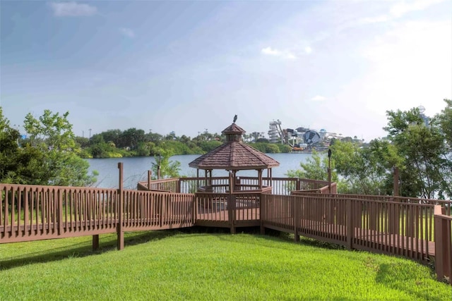 exterior space featuring a gazebo and a water view