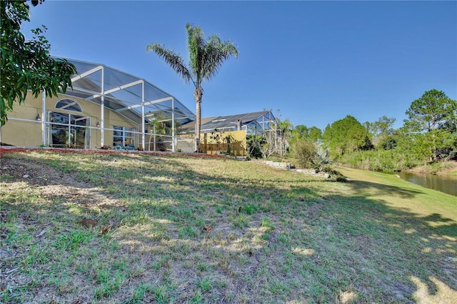 2981 Viscount Cir, Kissimmee, FL 34747 - view of grassy yard featuring a lanai