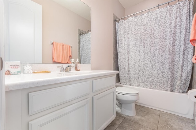 full bathroom featuring tile patterned flooring, vanity, toilet, and shower / tub combo with curtain