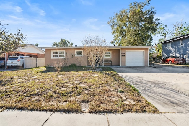 single story home with a garage