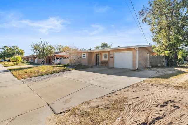 ranch-style home with a garage