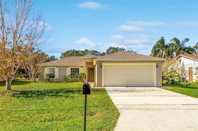 ranch-style house featuring a garage and a front lawn