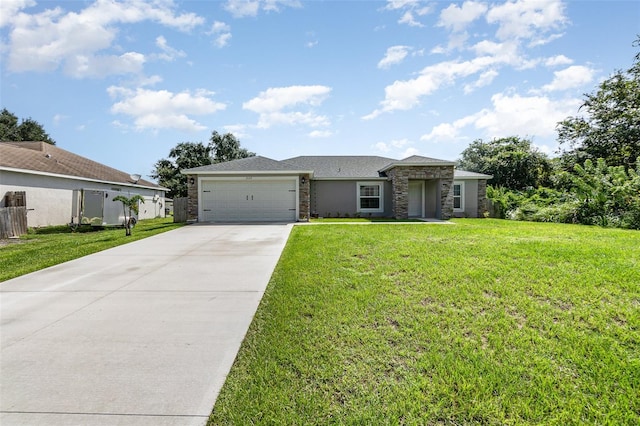 ranch-style home with a garage and a front lawn