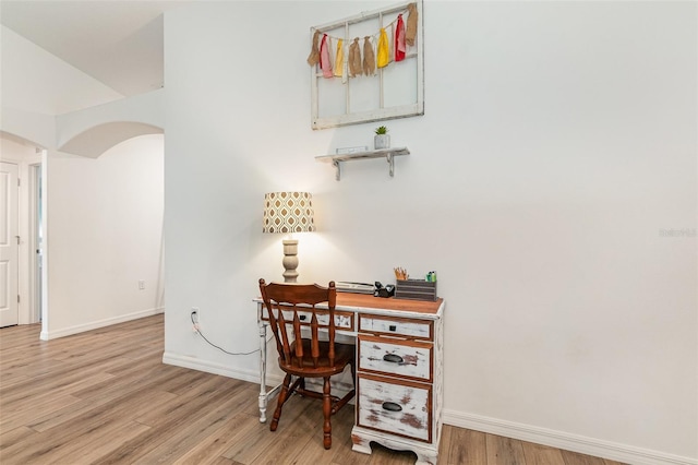 office space with light hardwood / wood-style floors