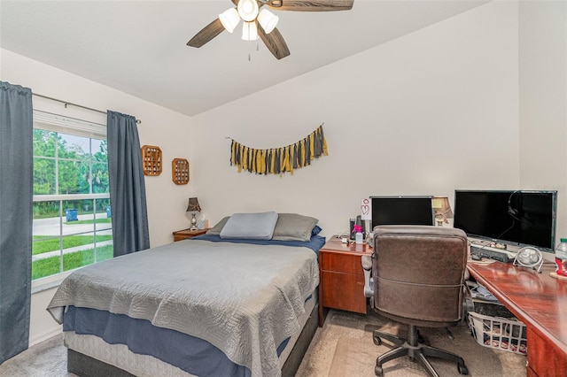 bedroom with light carpet and ceiling fan