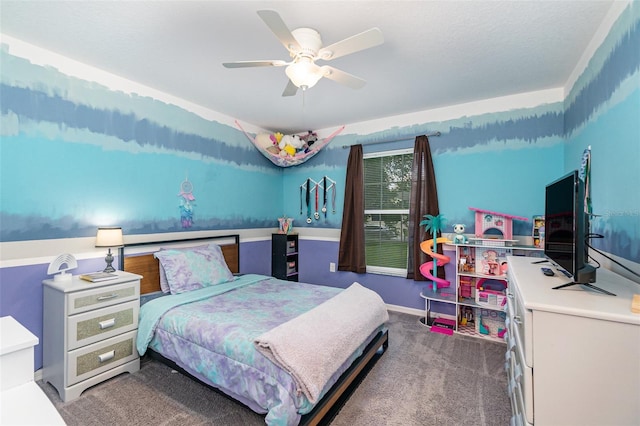 bedroom featuring ceiling fan and carpet