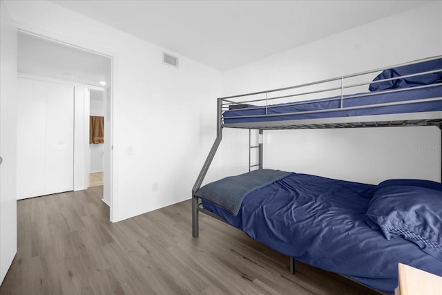 bedroom featuring hardwood / wood-style flooring