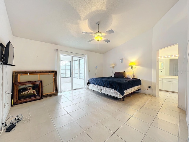 bedroom with access to outside, ceiling fan, light tile patterned flooring, and ensuite bathroom