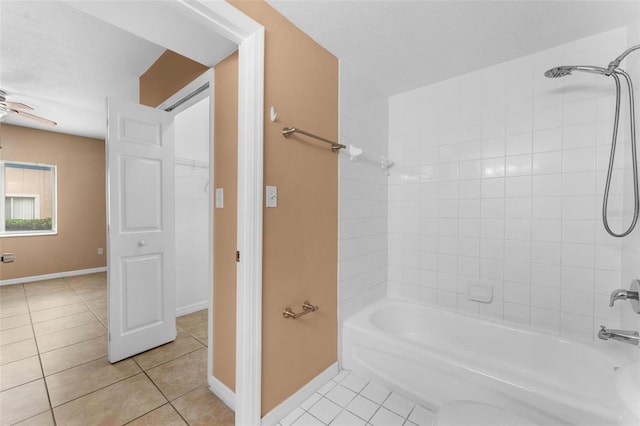 bathroom featuring tile patterned floors, ceiling fan, and tiled shower / bath combo