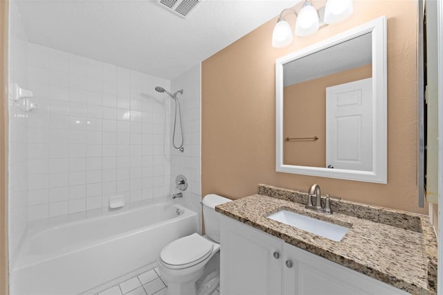 full bathroom featuring tub / shower combination, a textured ceiling, vanity, tile patterned flooring, and toilet