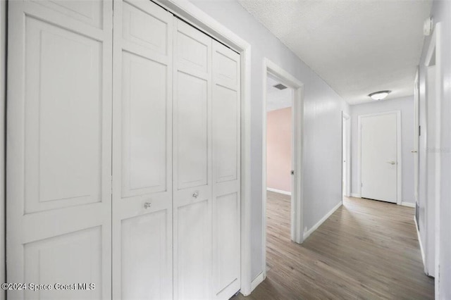 hall featuring hardwood / wood-style floors