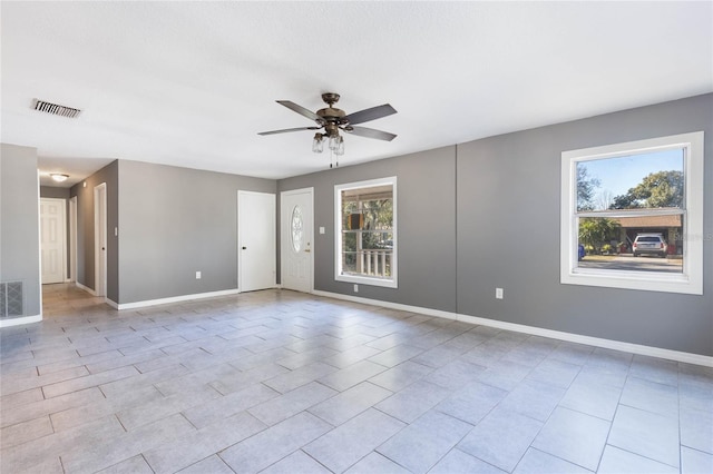 spare room featuring ceiling fan