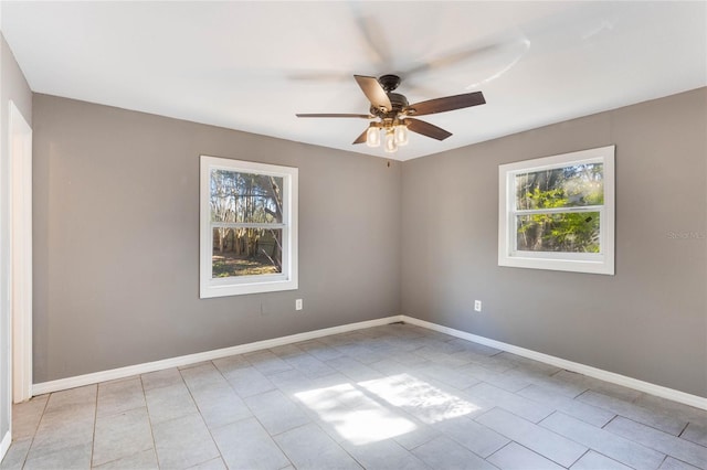 empty room featuring ceiling fan