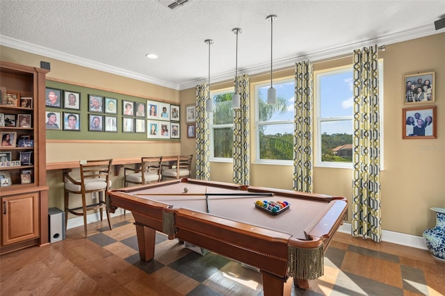 rec room with crown molding, dark hardwood / wood-style flooring, and pool table