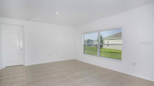 view of tiled spare room