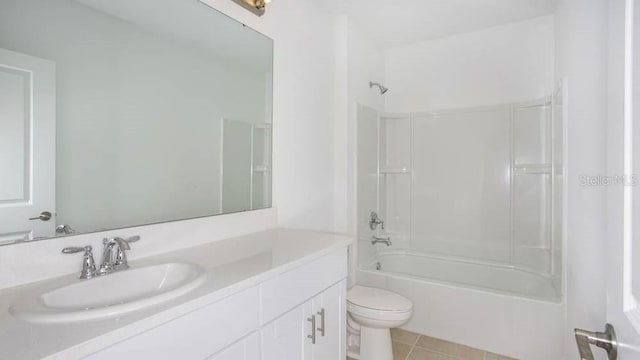 full bathroom with tile patterned floors, vanity, toilet, and shower / bathing tub combination