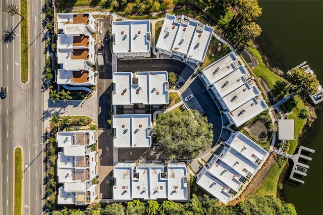 birds eye view of property featuring a water view