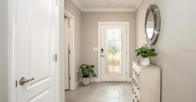 entryway featuring light tile patterned floors and ornamental molding