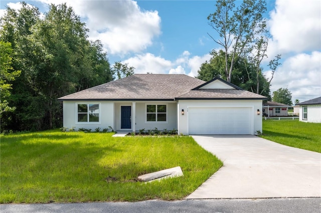 ranch-style home with a front yard and a garage