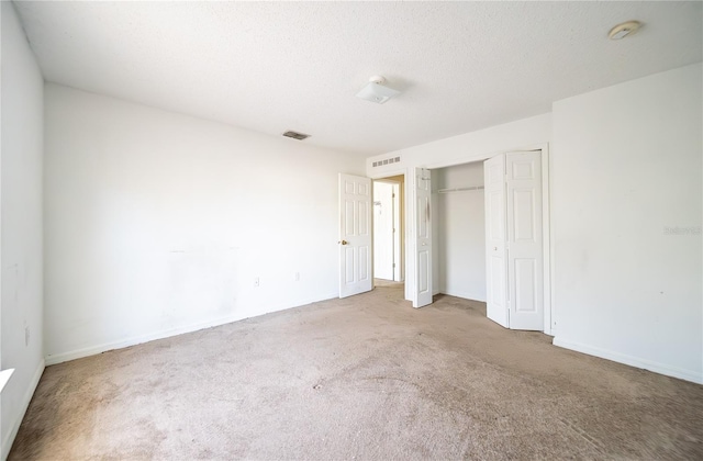 unfurnished bedroom featuring carpet flooring