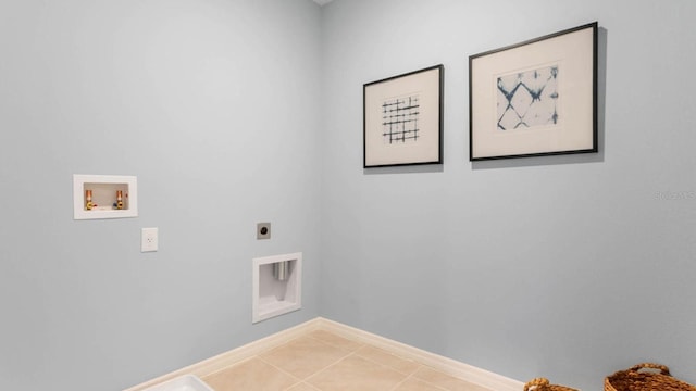 laundry room with tile patterned flooring, washer hookup, and hookup for an electric dryer