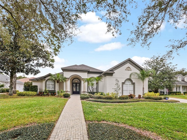 view of front of home featuring a front lawn