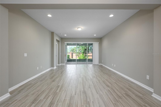 unfurnished living room featuring light hardwood / wood-style floors