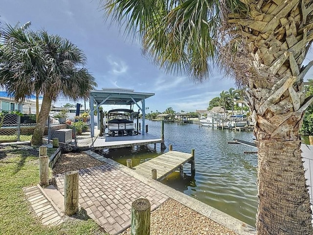 view of dock with a water view