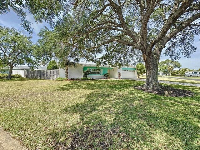 view of yard featuring a garage